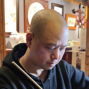梁显文