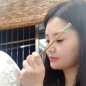 郑美端